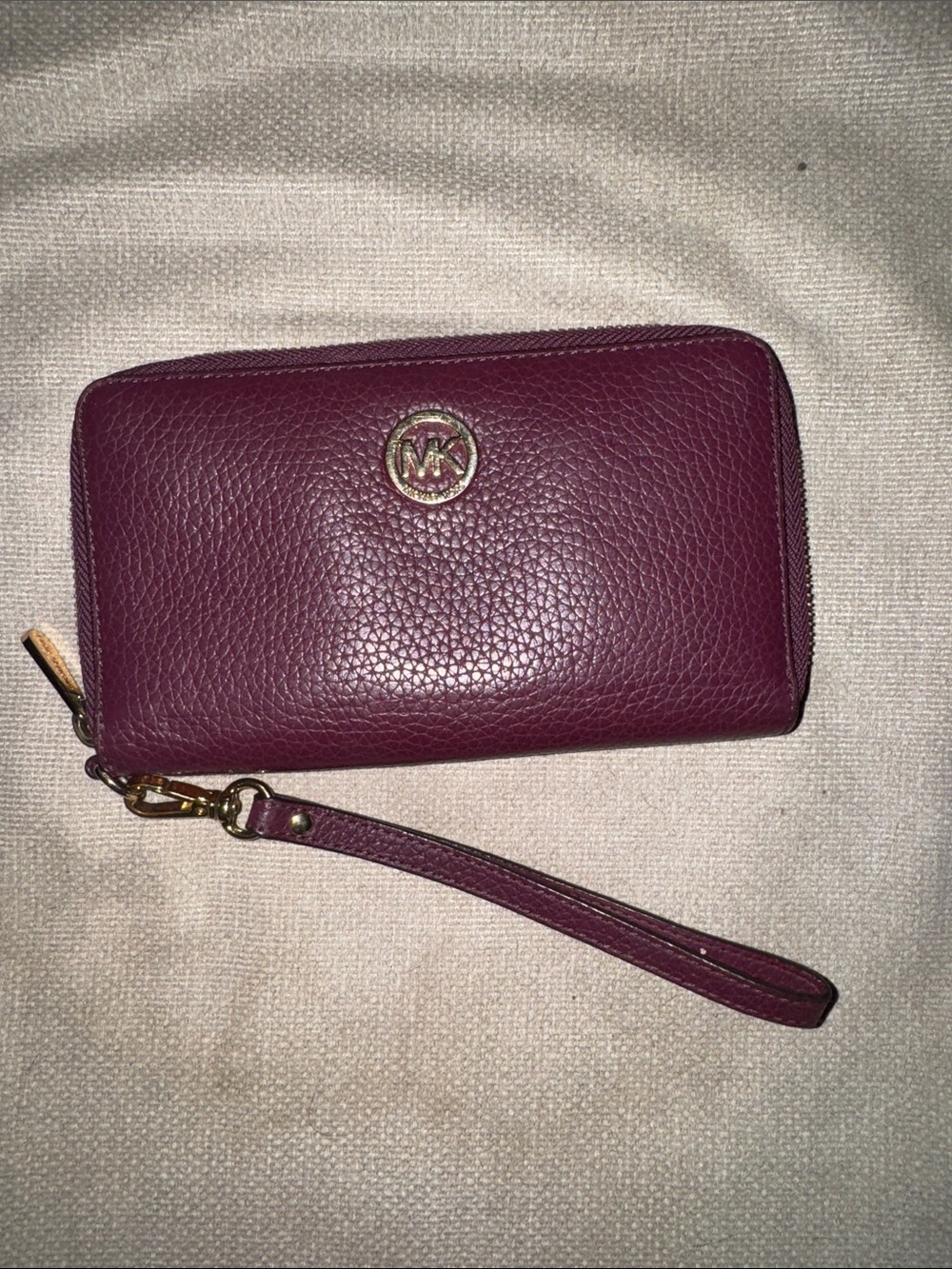 Michael Kors Plum Pebbled Leather Wristlet with Gold-Tone Logo